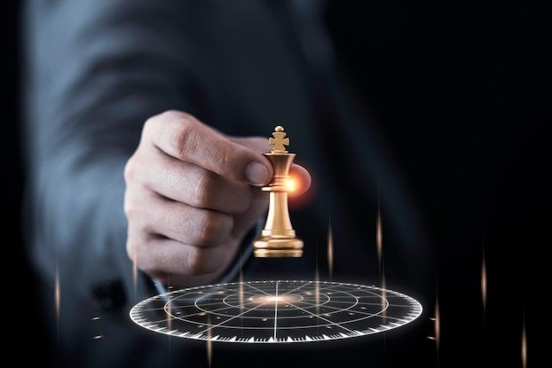 businessman-holding-throwing-golden-king-chess-virtual-target-dart-board_50039-1723